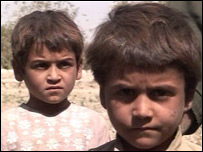 Afghani boys, orphaned by a bomb on their house
