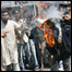 Shias burn Bush effigy in Srinagar